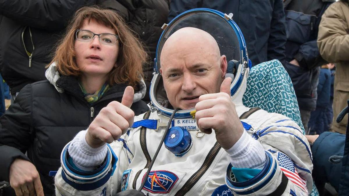FILE - In this Wednesday, March 2, 2016, file photo provided by NASA, International Space Station (ISS) crew member Scott Kelly of the U.S. reacts after landing near the town of Dzhezkazgan, Kazakhstan. Kelly is exploring lots of options for the next step in his life. But he’s saving the serious job discussions for retirement, coming up April 1. (Bill Ingalls/NASA via AP, File)