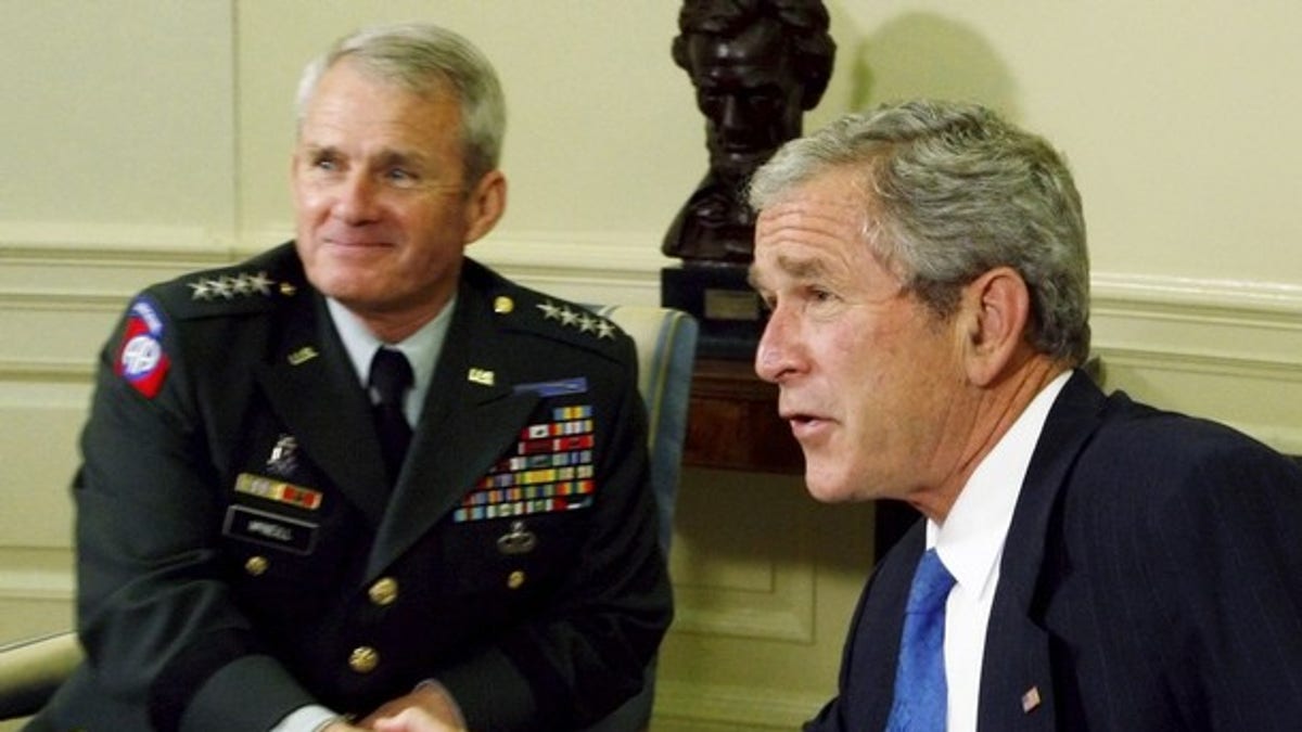 U.S. President George W. Bush meets with the former Commander of the International Security Assistance Force U.S. Army Gen. Dan McNeill in the Oval Office at the White House in Washington, June 17, 2008. REUTERS/Jim Young (UNITED STATES)