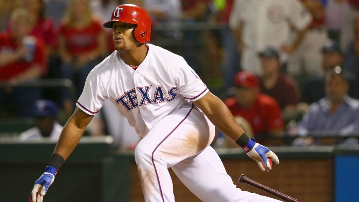 Pukulan besar Beltre mengangkat Rangers ke babak playoff, menempatkan perpecahan dalam jangkauan