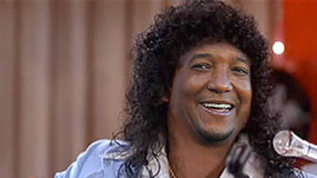 Pedro not giving up the jheri curl