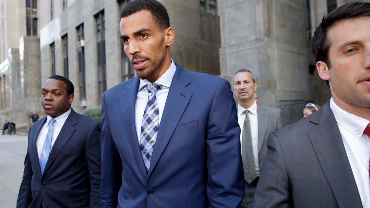 Oct. 7, 2015: Thabo Sefolosha, second from left, leaves criminal court in New York.