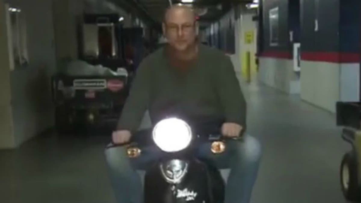 Watch Terry Francona cruise through the Indians' stadium on his scooter