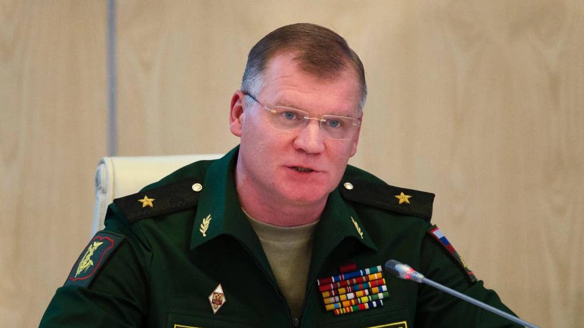 FILE In this Monday, Sept. 26, 2016 file photo Russian defense ministry spokesman Maj.-Gen. Igor Konashenkov speaks to the media in Moscow, Russia. Konashenkov strongly warned the United States against striking Syrian government forces and issued a thinly-veiled threat to use Russian air defense assets to protect them. (AP Photo/Ivan Sekretarev, file)