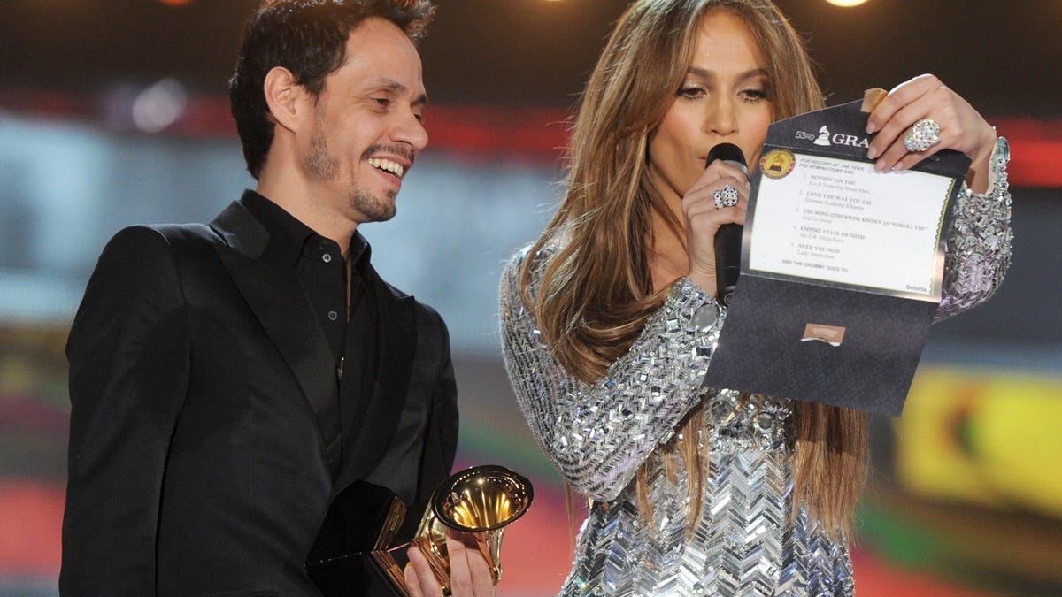 LOS ANGELES, CA - FEBRUARY 13:  Singer Marc Anthony and actress Jennifer Lopez speak onstage during The 53rd Annual GRAMMY Awards held at Staples Center on February 13, 2011 in Los Angeles, California.  (Photo by Kevin Winter/Getty Images)