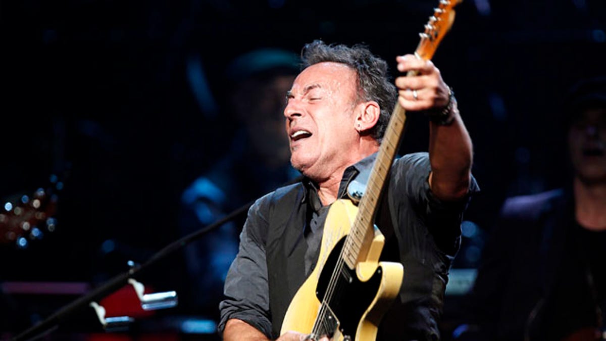 Bruce Springsteen and the E Street Band perform onstage during SiriusXM's 10th anniversary celebration at the Apollo Theater in Harlem, New York March 9, 2012.      REUTERS/Carlo Allegri (UNITED STATES - Tags: ENTERTAINMENT)