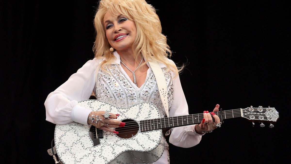 American country music star Dolly Parton performs on the Pyramid Stage at Worthy Farm in Somerset, during the Glastonbury Festival June 29, 2014.