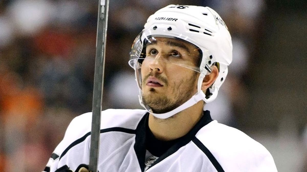 Sep 28, 2014; Anaheim, CA, USA; Los Angeles Kings defender Slava Voynov (26) looks up during a break in play against the Anaheim Ducks during the third period at Honda Center. The Los Angeles Kings defeated the Anaheim Ducks with a final score of 4-2. Mandatory Credit: Kelvin Kuo-USA TODAY Sports