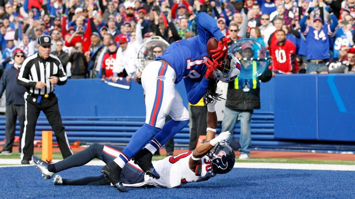 Dec 6, 2015; Orchard Park, NY, USA; Buffalo Bills wide receiver Sammy Watkins (14) makes a catch for a touchdown as Houston Texans strong safety Kevin Johnson (30) defends during the first quarter at Ralph Wilson Stadium. Mandatory Credit: Kevin Hoffman-USA TODAY Sports