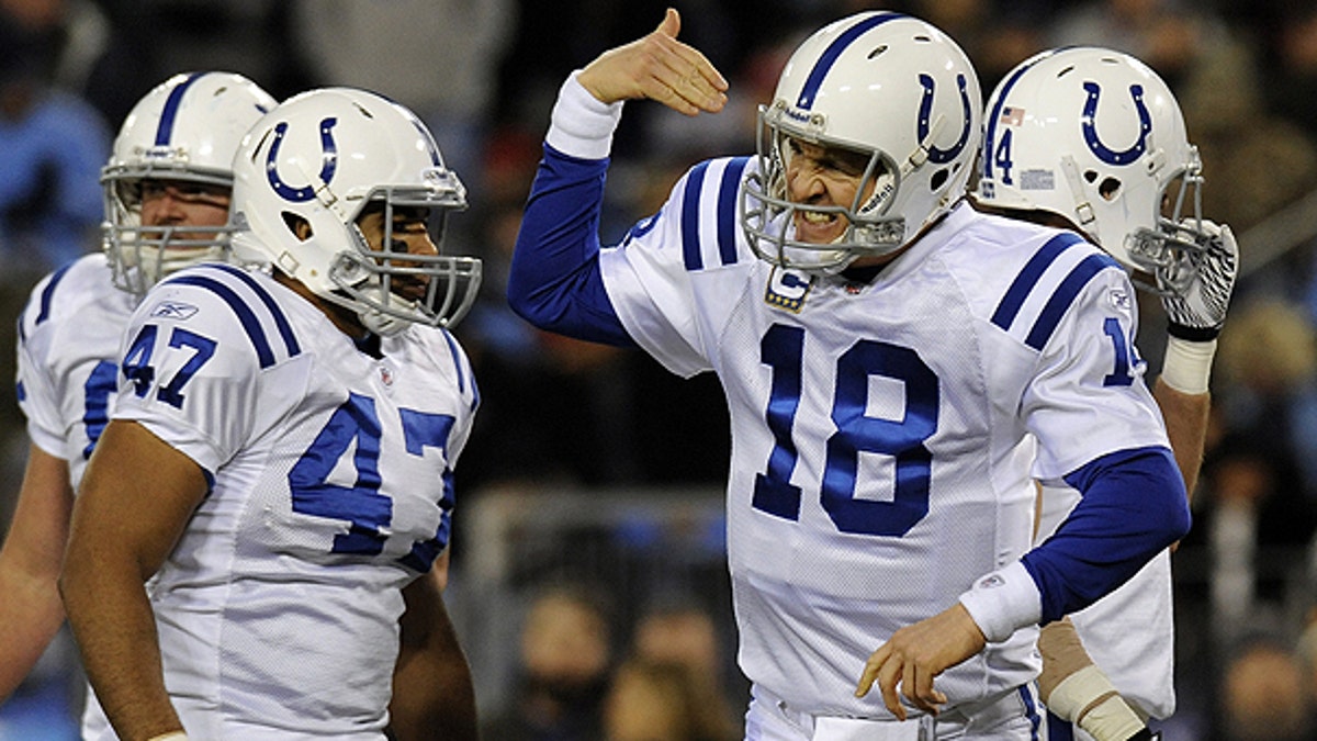 Dec. 9: Indianapolis Colts quarterback Peyton Manning (18) calls a teammate to the huddle in the second quarter of an NFL football game against the Tennessee Titans in Nashville, Tenn.