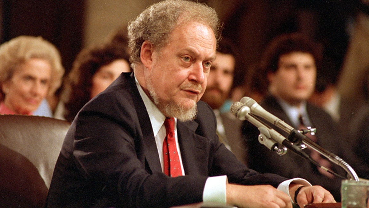 FILE - In this Sept. 16, 1987 file photo, U.S. Supreme Court nominee Robert H. Bork testifies before the Senate Judiciary Committee during his confirmation hearings on Capitol Hill.   Robert Bork, whose failed Supreme Court nomination made history, has died.  (AP Photo/Charles Tasnadi)