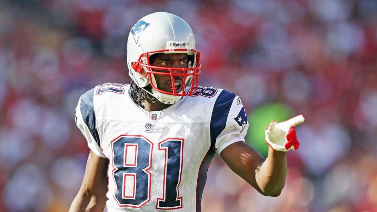 SAN FRANCISCO - OCTOBER 5: Randy Moss #81 of the New England Patriots motions on the field during the game against the San Francisco 49ers on October 5, 2008 at Candlestick Park in San Francisco, California. (Photo by Jed Jacobsohn/Getty Images)