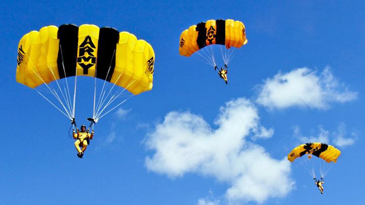 U.S. Army Parachute Team members prepare to land on target as part of the Golden Knights annual certification cycle on Homestead Air Reserve Base, Fla., Jan. 27, 2014.