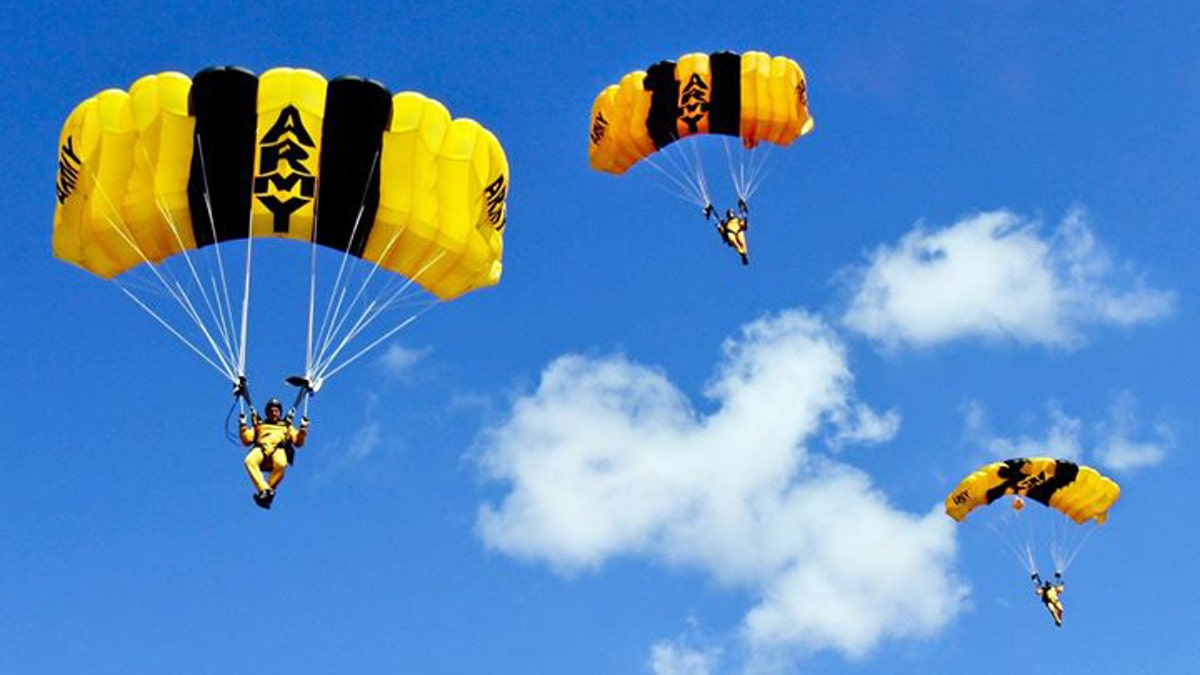 U.S. Army Parachute Team members prepare to land on target as part of the Golden Knights annual certification cycle on Homestead Air Reserve Base, Fla., Jan. 27, 2014.