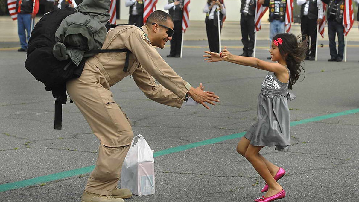 Military dad greets daughter