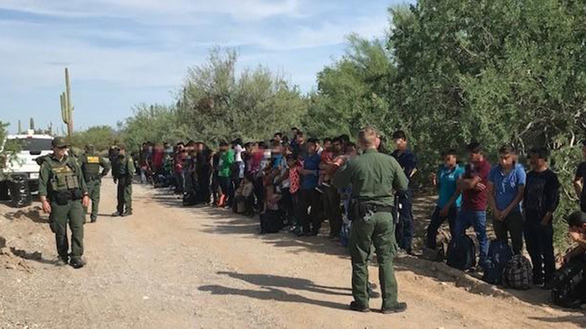 Ajo Station Border Patrol agents encountered a group of 128 illegal aliens several miles west of the Lukeville Port on Friday