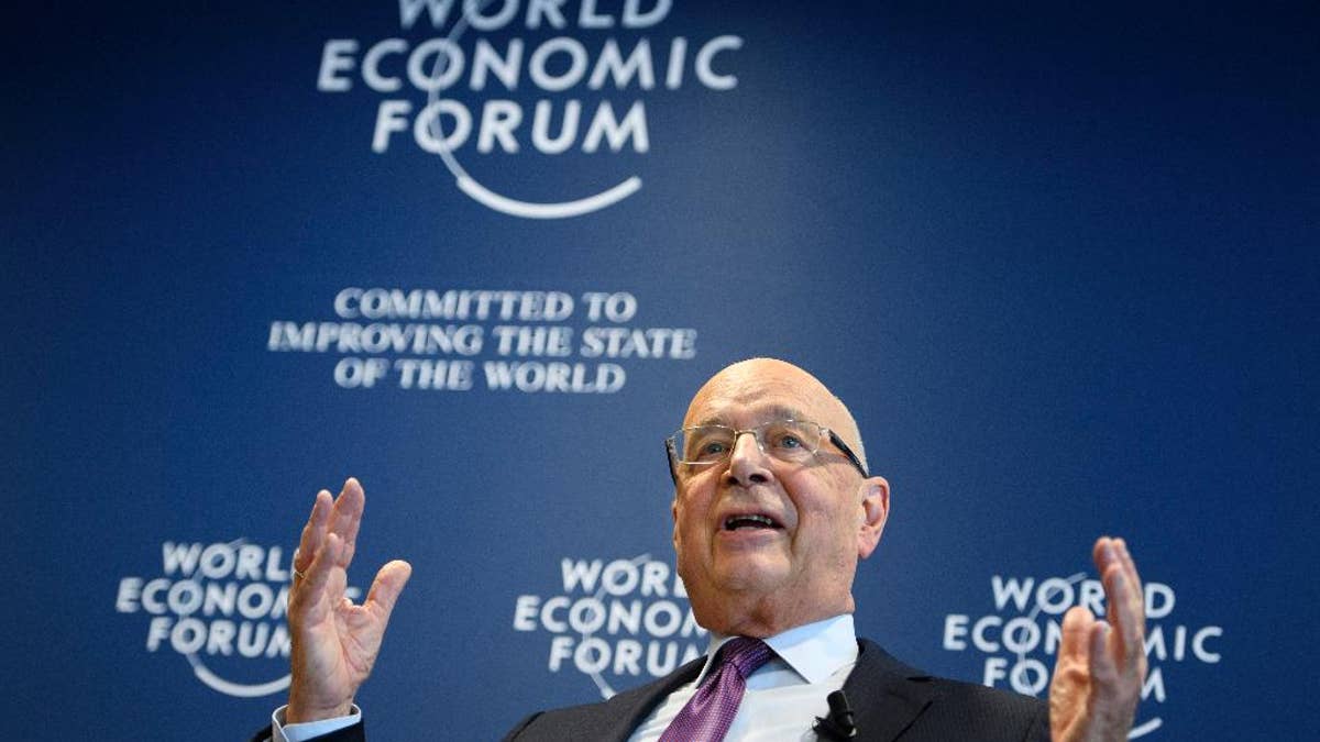 German Klaus Schwab, founder and president of the World Economic Forum, WEF, gestures during a press conference, in Cologny near Geneva, Switzerland, Tuesday, Jan. 10, 2017. The World Economic Forum unveiled the program for its annual meeting in Davos, Switzerland, including the key participants, themes and goals. The overarching theme of the meeting, which will take place from Jan. 17 to 20, is "Responsive and Responsible Leadership". (Laurent Gillieron/Keystone via AP)