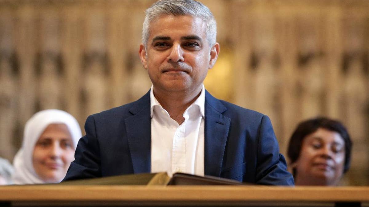 London's new mayor Sadiq Khan attends the official signing ceremony in Southwark Cathedral, London, Saturday May 7, 2016. On Friday the 45-year-old Labour Party politician became the first person of Islamic faith to lead Europe's largest city. (Yui Mok/Pool via AP)