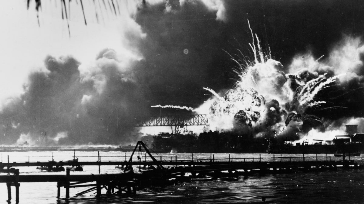 The forward magazine of the destroyer USS Shaw explodes during the second Japanese attack wave on Pearl Harbor, Hawaii, U.S. December 7, 1941. The 75th anniversary of the attack, which brought the United States into World War Two, is marked on December 7, 2016 U.S. Naval History and Heritage Command/Handout via Reuters ATTENTION EDITORS - THIS IMAGE WAS PROVIDED BY A THIRD PARTY. EDITORIAL USE ONLY. - RTSU80Q