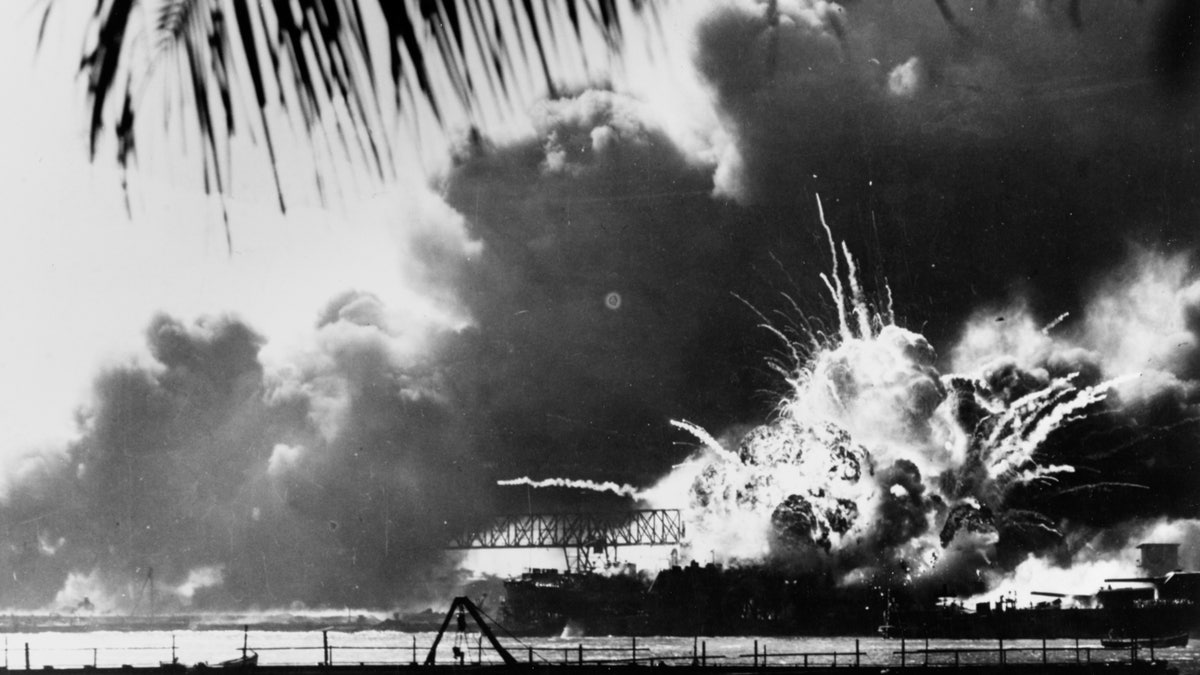 The forward magazine of the destroyer USS Shaw explodes during the second Japanese attack wave on Pearl Harbor, Hawaii, U.S. December 7, 1941. The 75th anniversary of the attack, which brought the United States into World War Two, is marked on December 7, 2016 U.S. Naval History and Heritage Command/Handout via Reuters ATTENTION EDITORS - THIS IMAGE WAS PROVIDED BY A THIRD PARTY. EDITORIAL USE ONLY. - RTSU80Q