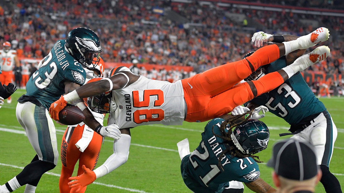 Cleveland Browns tight end David Njoku (85) is up-ended during the first half of an NFL preseason football game against the Philadelphia Eagles, Thursday, Aug. 23, 2018, in Cleveland. (AP Photo/David Richard)