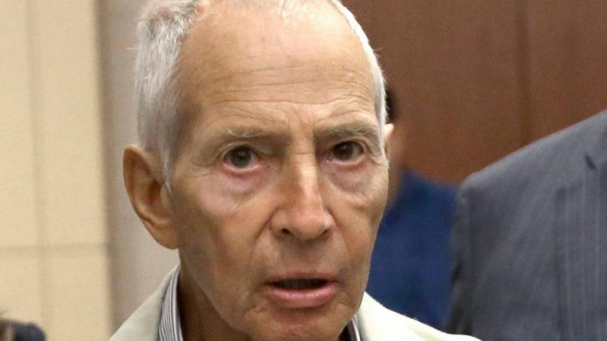 FILE - In this Aug. 15, 2014 file photo, New York City real estate heir Robert Durst leaves a Houston courtroom. Durst has made his long-awaited arrival in California to face charges of killing a friend 16 years ago. The Los Angeles County District Attorney's Office says Durst was locked up in a county jail Friday, Nov. 4, 2016. He's scheduled to face arraignment Monday for the killing of friend Susan Berman in 2000.  (AP Photo/Pat Sullivan, File)