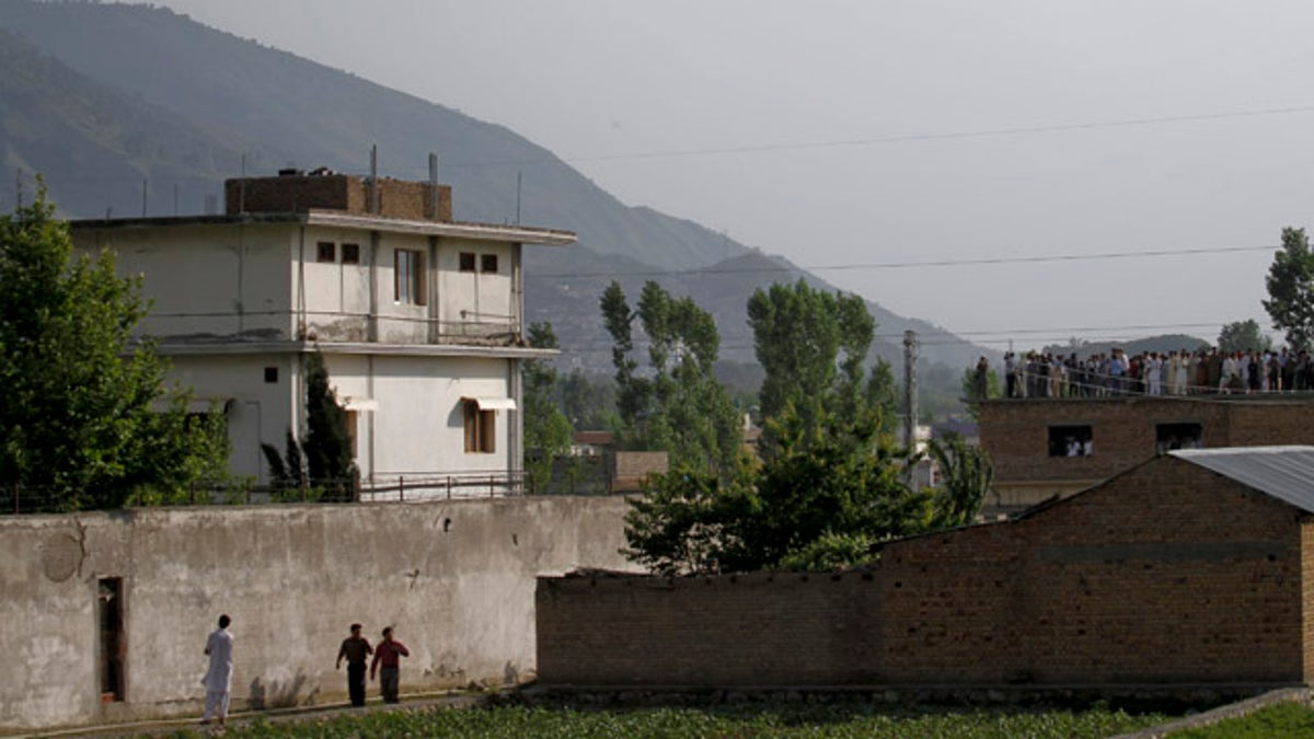 A Pakistan army helicopter heads back after flying over the compound  where Al Qaeda leader Usama bin Laden was killed in 2011. (AP Photo/Anjum Naveed)