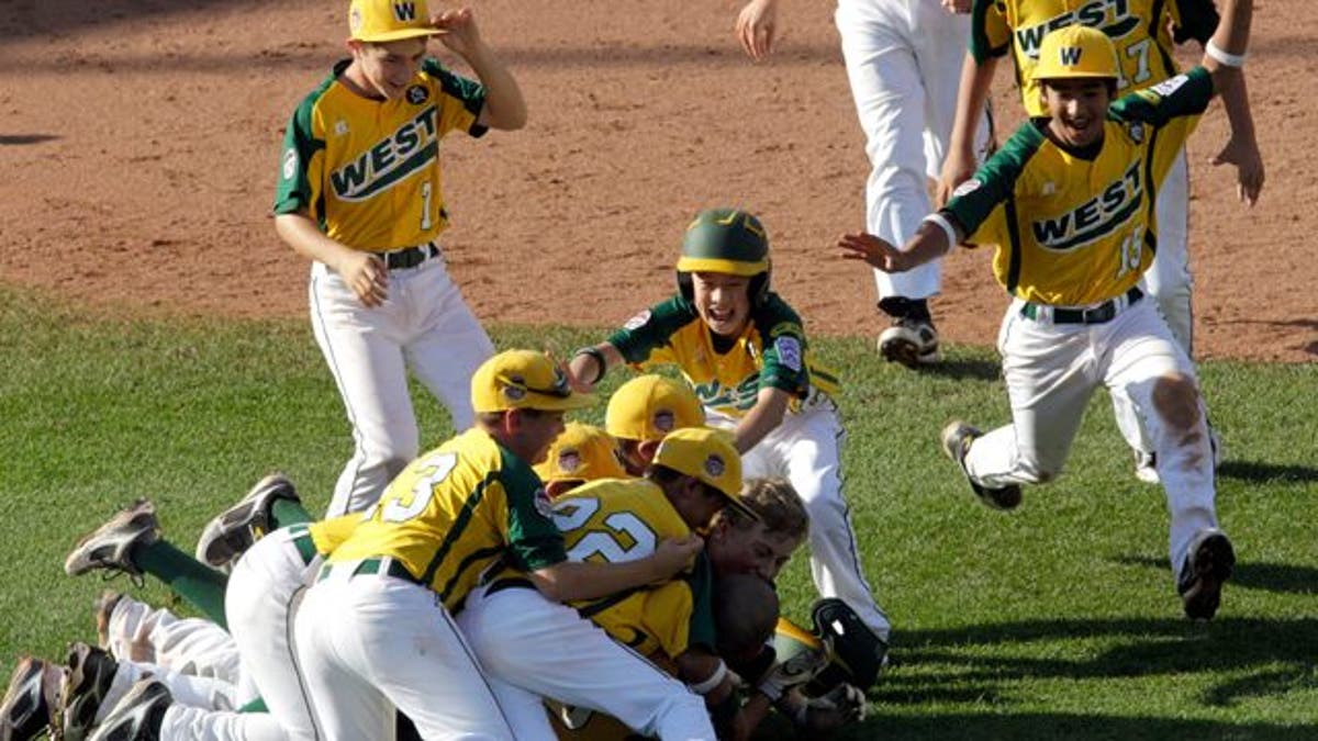 Huntington Beach, Calif.'s Eric Anderson (12) celebrates with