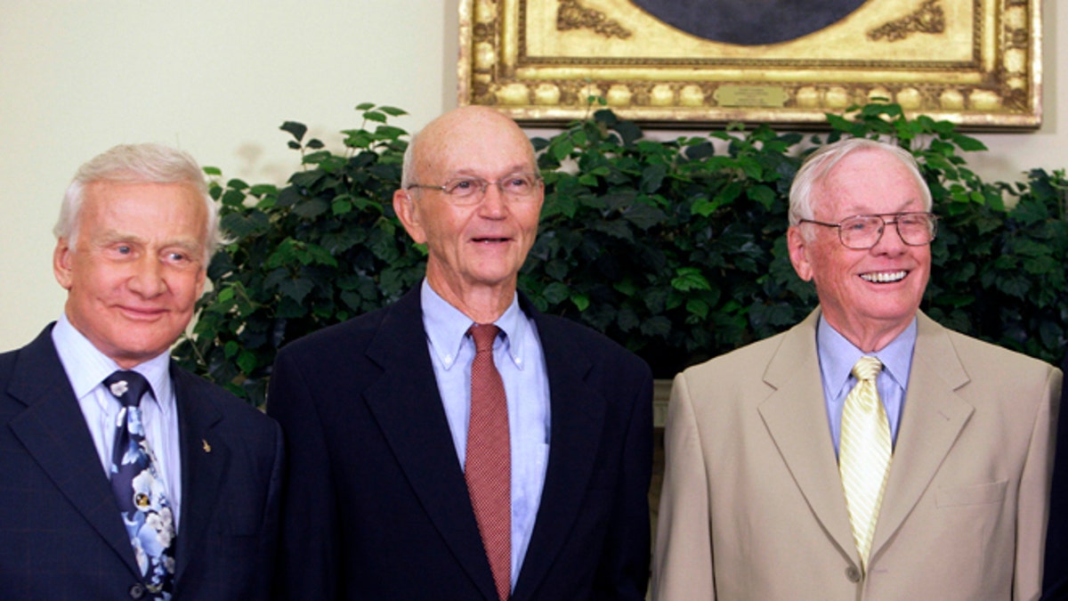 In this July 20, 2009, photo, Buzz Aldrin, left, Michael Collins, center, and Neil Armstrong stand in the Oval Office at the White House in Washington, on the 40th anniversary of the Apollo 11 moon landing.