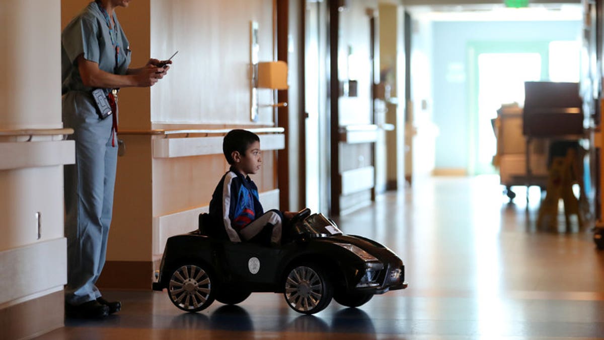 Hospital lets kids drive themselves to operating room