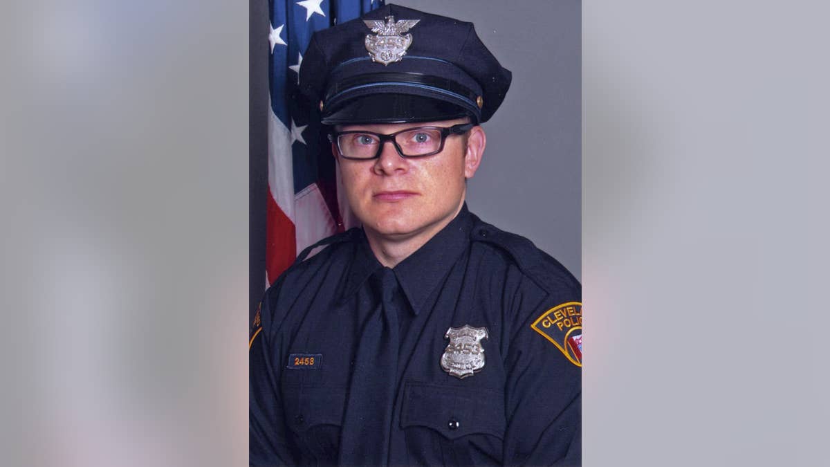 This undated photo provided by the city of Cleveland's Division of Police shows Patrolman David Fahey, who authorities say was struck and killed Tuesday, Jan. 24, 2017, by a hit-and-run driver as Fahey placed road flares near two auto accidents on Interstate 90 in Cleveland. Israel Alvarez was arrested later that day in Lorain, Ohio, about 30 miles west of Cleveland, and a police spokeswoman said Wednesday, Jan. 25, 2017, that Alvarez was charged with aggravated vehicular homicide and felony hit-skip.  (Cleveland Division of Police via AP)