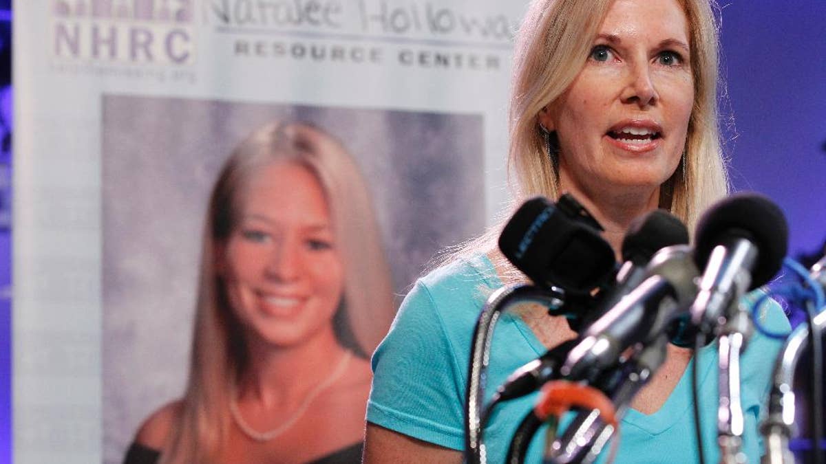 FILE - In this June 8, 2010, file photo, Beth Holloway, mother of Natalee Holloway, speaks during the opening of the Natalee Holloway Resource Center (NHRC) at the National Museum of Crime & Punishment in Washington. Beth Holloway said on NBC's "Today" show Monday, August, 29, 2016, that justice hasn't been served in her daughter's death. (AP Photo/Pablo Martinez Monsivais, File)
