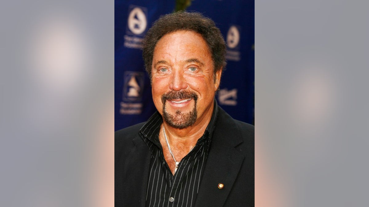 Singer Tom Jones poses as he arrives at the Grammy Foundation's Starry Night gala honoring Sir George Martin in Los Angeles, California  July 12,  2008. Martin was the music producer for the Beatles.  REUTERS/Fred Prouser                (UNITED STATES) - GM1E47D0WO401