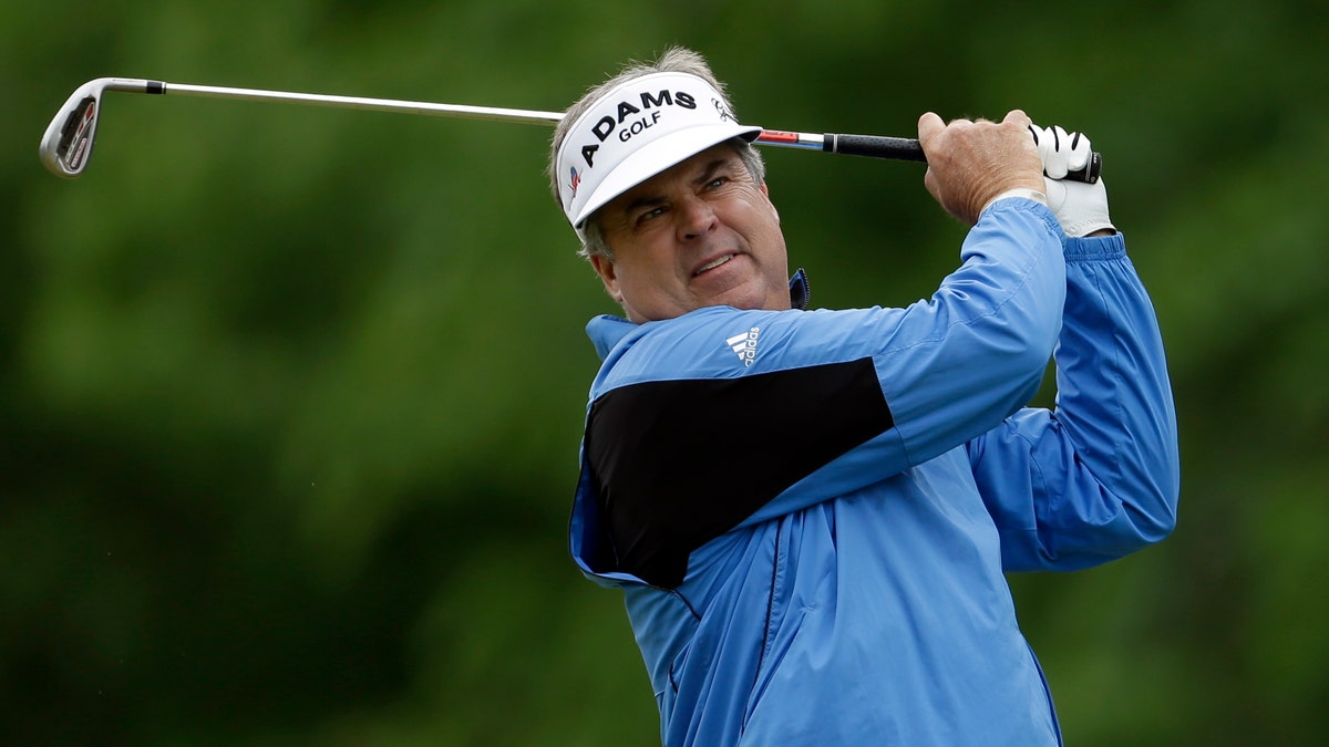 Kenny Perry tees off on the second hole during the third round of the Senior PGA Championship golf tournament at Bellerive Country Club, Saturday, May 25, 2013, in St. Louis. (AP Photo/Jeff Roberson)