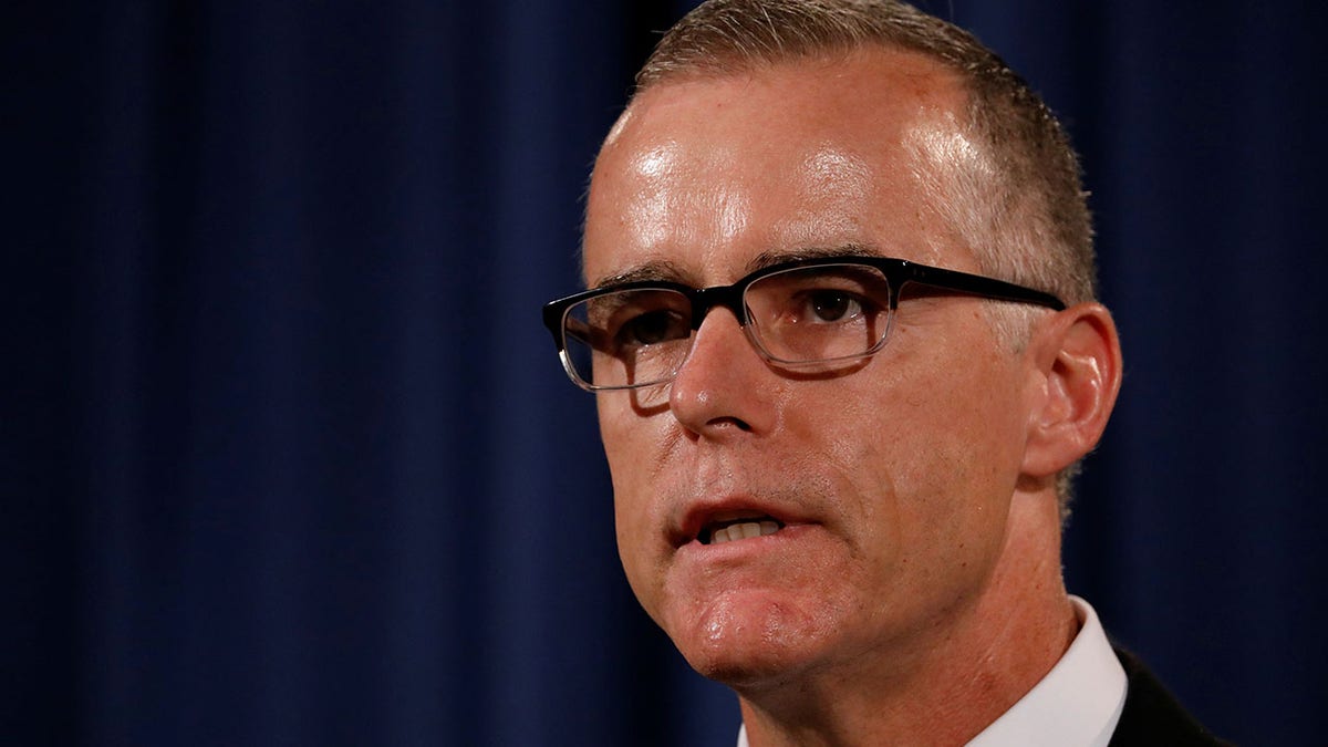 Acting FBI Director Andrew McCabe announces the results of the national health care fraud takedown during a news conference at the Justice Department in Washington, U.S., July 13, 2017. REUTERS/Aaron P. Bernstein - RC187D475C60