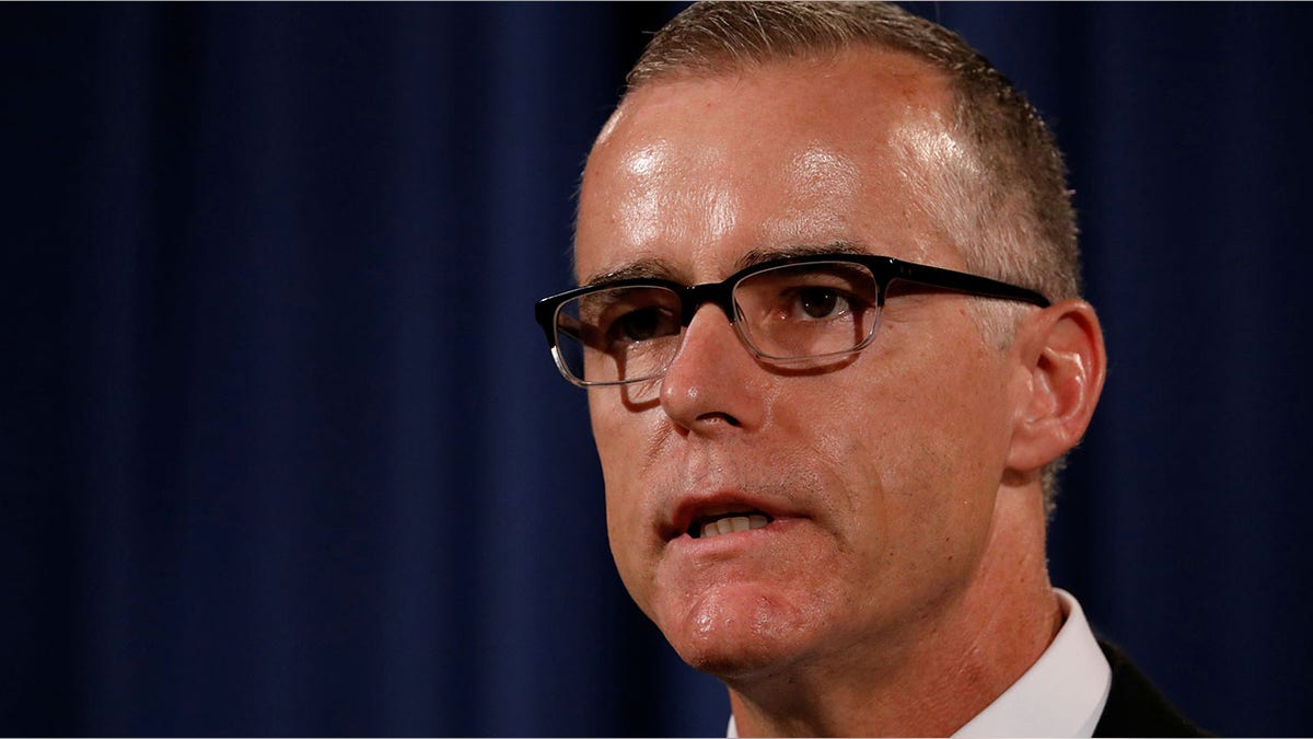 Acting FBI Director Andrew McCabe announces the results of the national health care fraud takedown during a news conference at the Justice Department in Washington, U.S., July 13, 2017. REUTERS/Aaron P. Bernstein - RC187D475C60