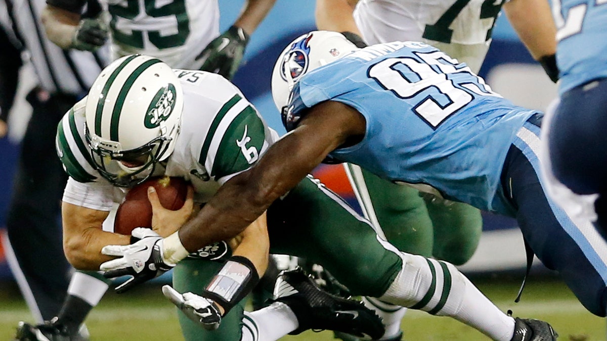 297f38b2-Jets Titans Football