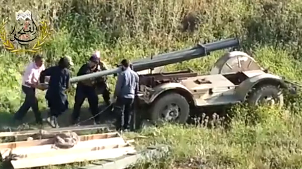 6734f9e8-Mideast Syria