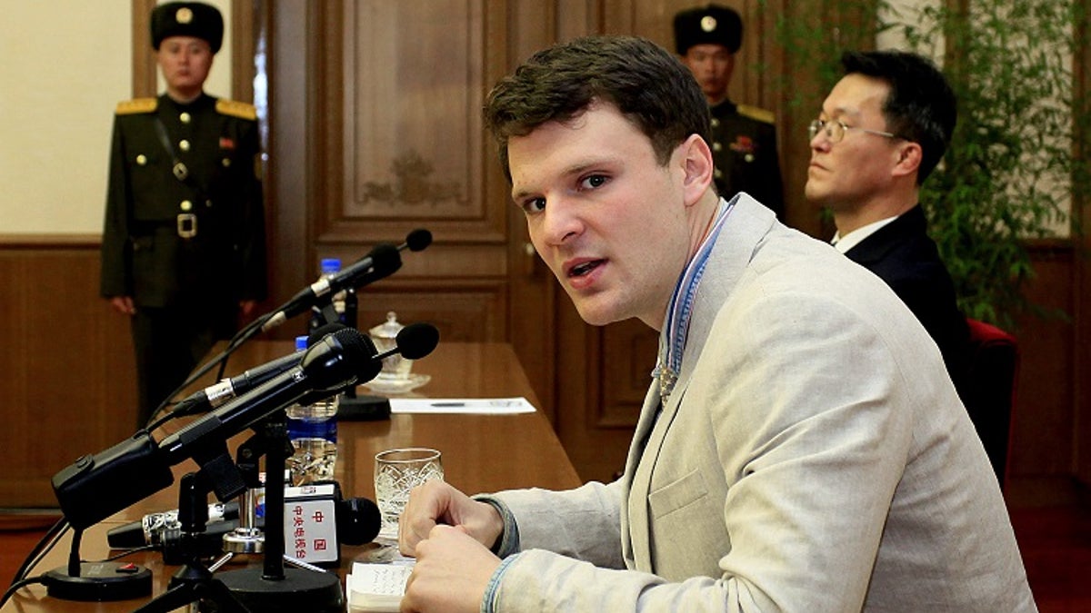 FILE - In this Feb. 29, 2016 file photo, American student Otto Warmbier speaks as Warmbier is presented to reporters in Pyongyang, North Korea.  U.S. officials say the Trump administration will ban American citizens from traveling to North Korea following the death of university student Otto Warmbier, who passed away after falling into a coma into a North Korean prison. (AP Photo/Kim Kwang Hyon)