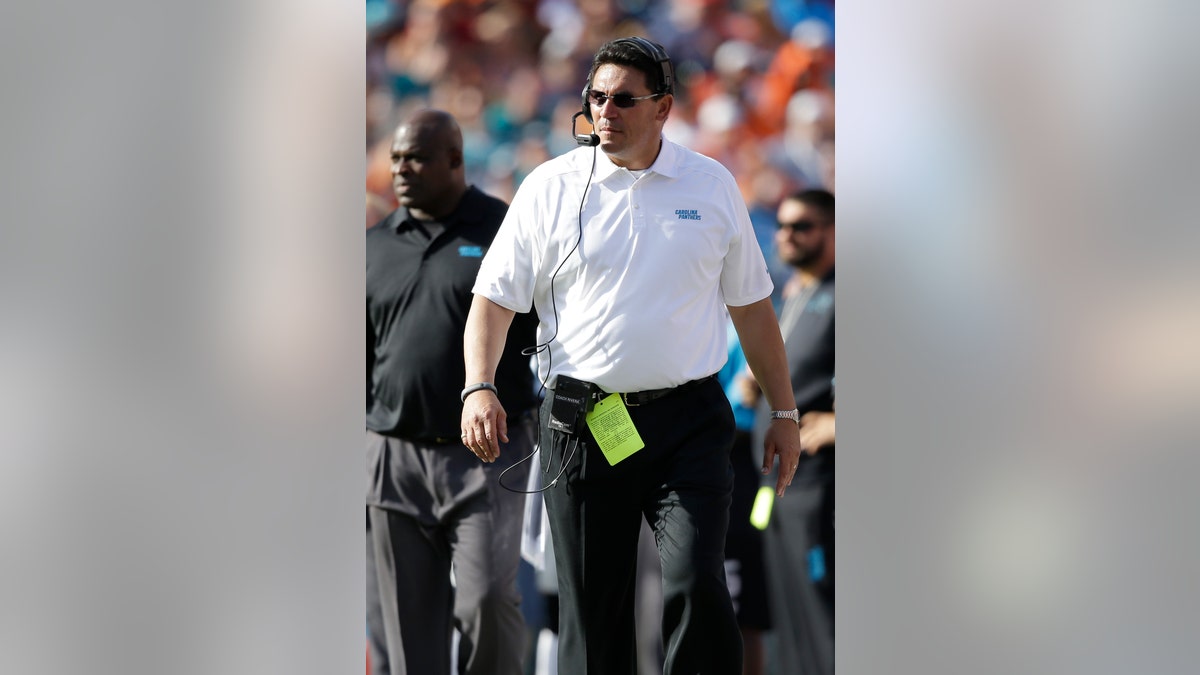 ea61c567-Panthers Dolphins Football