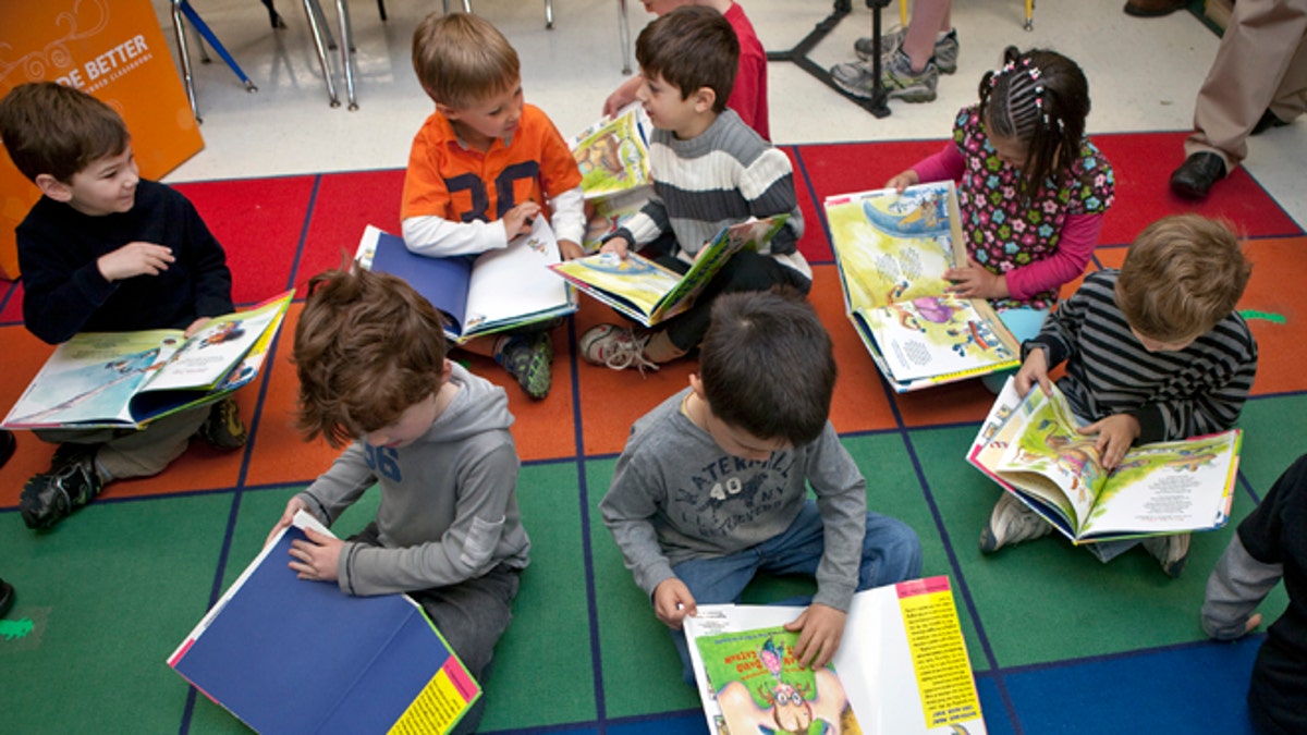 WESTON, CT - APRIL 26: Students in pre-kindergartner class enjoy reading a book by children's aiuthor Alan Katz during OfficeMax's "A Day Made Better" presentation at Hurlbutt Elementary School on April 26, 2010 in Weston, Connecticut in which $1,000 in school supplies were given to the class. (Photo by Wendy Carlson/Getty Images for OfficeMax)