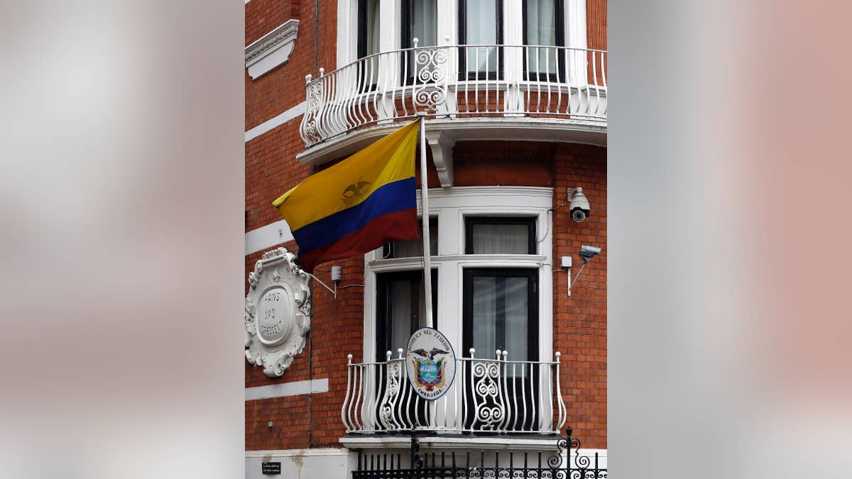 The Ecuadorian flag flies outside the Ecuadorian Embassy in London, Friday, Sept. 16, 2016. A Swedish appeals court has upheld a detention order for WikiLeaks founder Julian Assange, who is wanted by prosecutors in a rape investigation. The decision Friday by the Svea Court of Appeal means that the arrest warrant stands for the 45-year-old Australian, who has avoided extradition to Sweden by seeking shelter at the Ecuadorian Embassy in London since 2012. (AP Photo/Kirsty Wigglesworth)