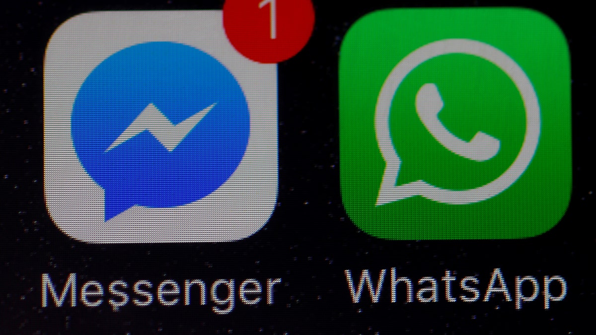 WhatsApp and Facebook messenger icons are seen on an iPhone in Manchester , Britain March 27, 2017. REUTERS/Phil Noble - RTX32Y13