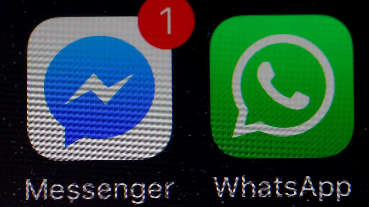 WhatsApp and Facebook messenger icons are seen on an iPhone in Manchester , Britain March 27, 2017. REUTERS/Phil Noble - RTX32Y13