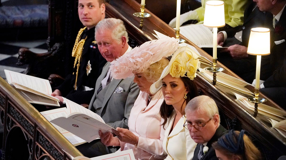 From left, Britain's Prince William, Prince Charles, Camilla Duchess of Cornwall, Kate Duchess of Cambridge, Prince Andrew and Princess Beatrice at the wedding ceremony of Prince Harry and Meghan Markle at St. George's Chapel in Windsor Castle in Windsor, near London, England, Saturday, May 19, 2018. (Owen Humphreys/pool photo via AP)