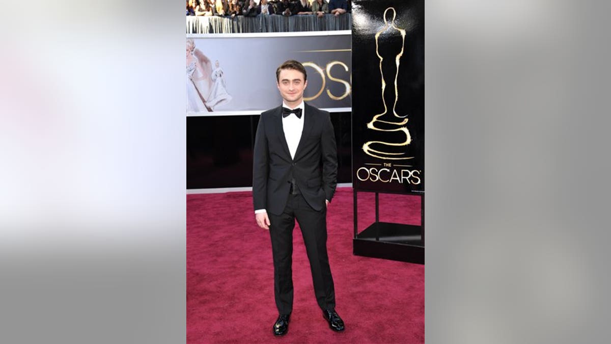 Actor Daniel Radcliffe arrives at the 85th Academy Awards at the Dolby Theatre on Sunday Feb. 24, 2013, in Los Angeles. (Photo by John Shearer/Invision/AP)