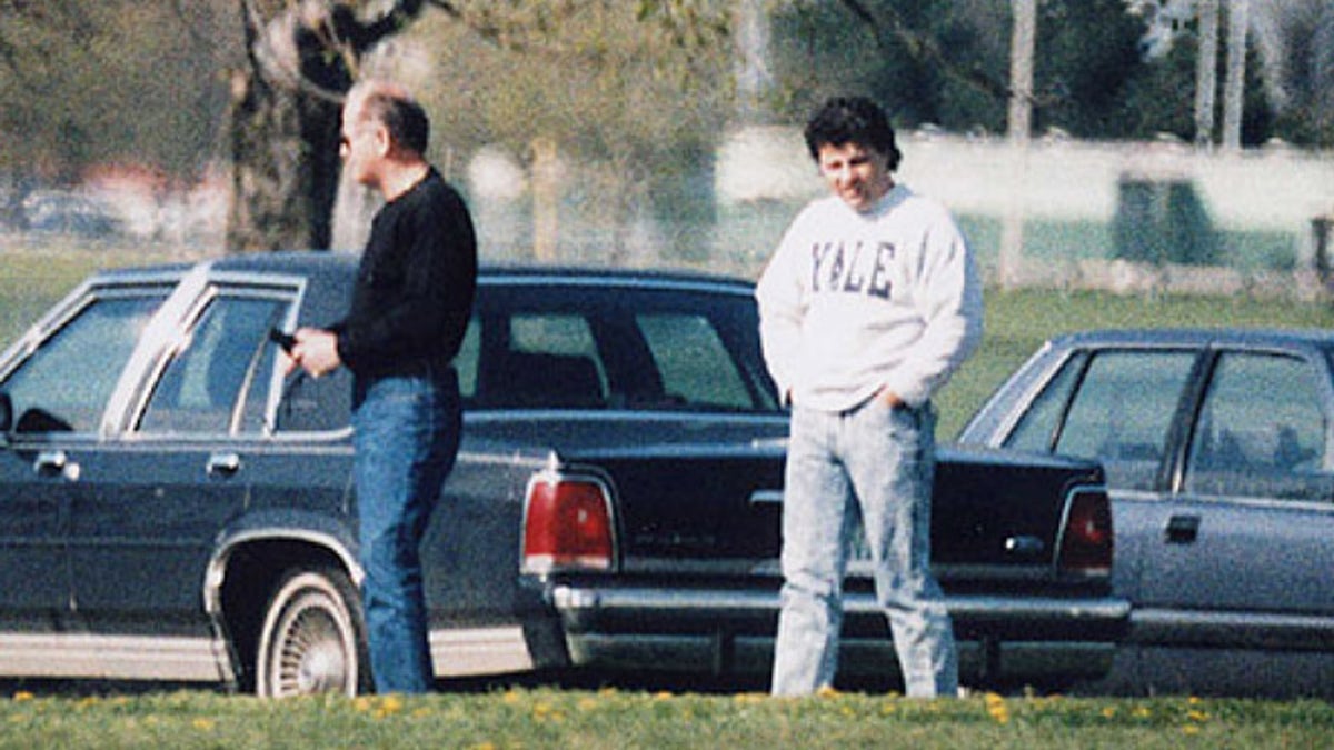 This undated surveillance photo released by the U.S. Attorney's office at federal court in Boston shows James 'Whitey' Bulger, left, with his former right hand man, Kevin Weeks. 