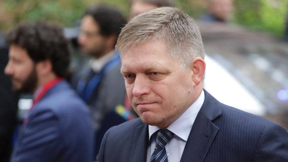 FILE- In this Oct. 20, 2016 file photo Slovakian Prime Minister Robert Fico arrives for the EU summit in Brussels. Slovakia has established a new police unit to fight terrorism and far-right extremism. Prime Minister Robert Fico, who introduced the new unit Wednesday Feb. 1, 2017, said that he is glad that police can now 