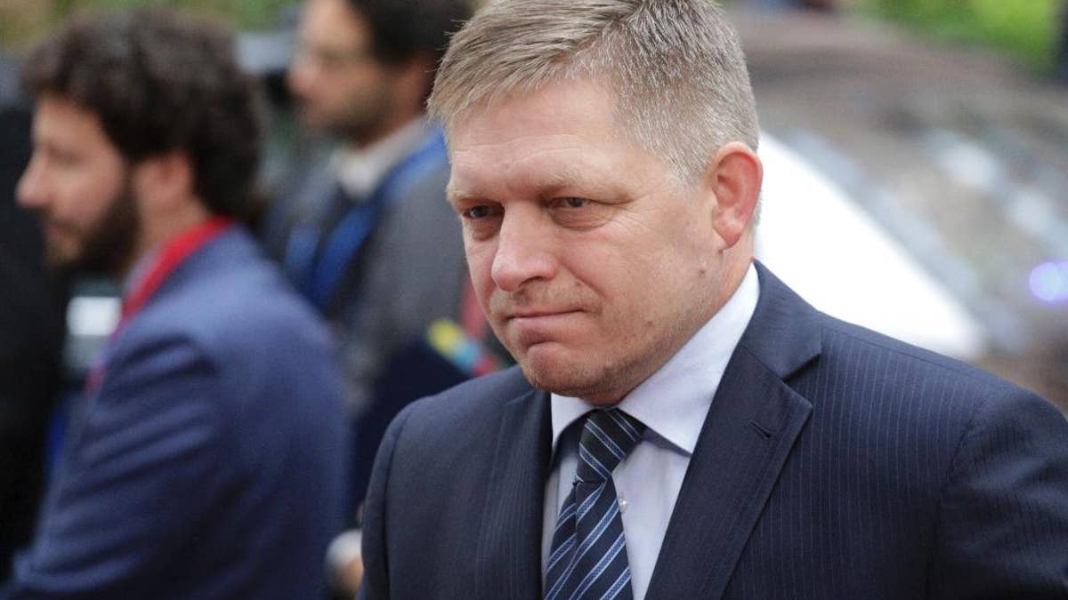FILE- In this Oct. 20, 2016 file photo Slovakian Prime Minister Robert Fico arrives for the EU summit in Brussels. Slovakia has established a new police unit to fight terrorism and far-right extremism. Prime Minister Robert Fico, who introduced the new unit Wednesday Feb. 1, 2017, said that he is glad that police can now