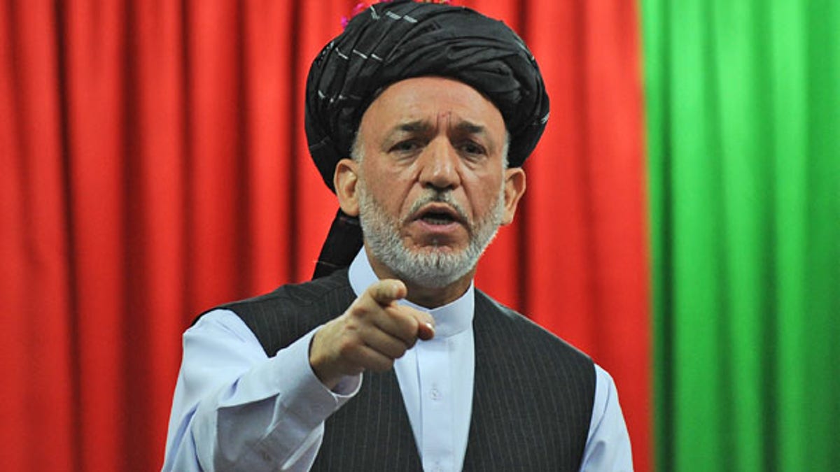 44958972-Afghanistan Unrest Karzai