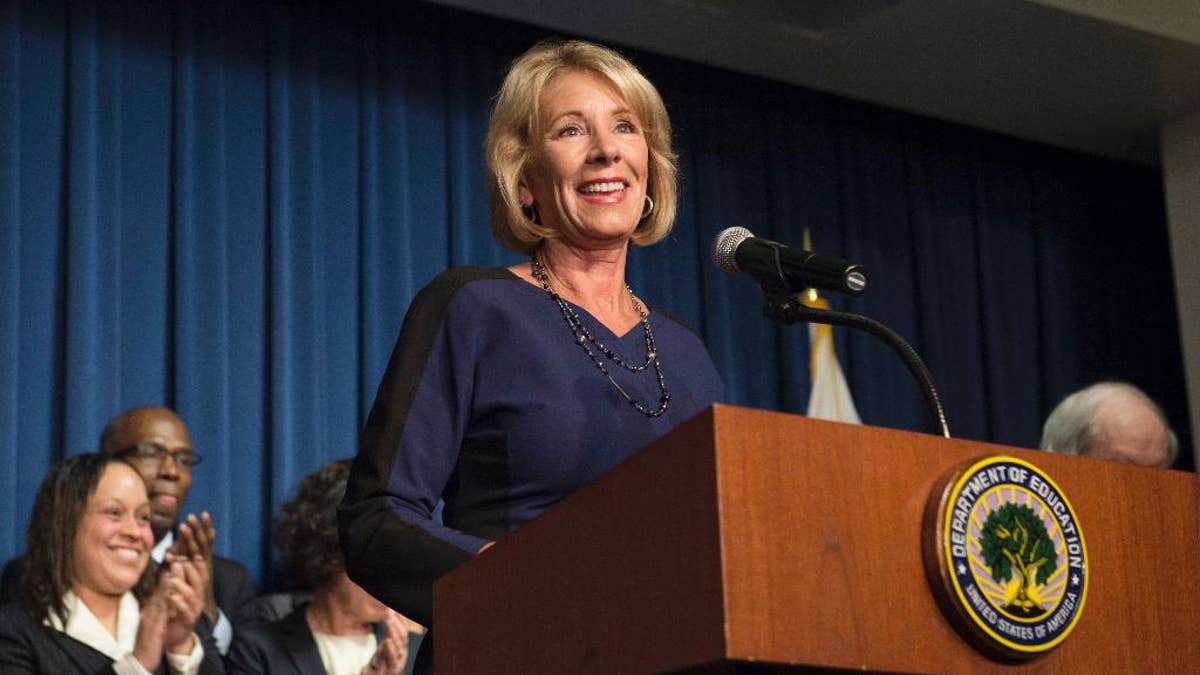 Education Secretary Betsy DeVos addresses Education Department staff, Wednesday, Feb. 8, 2017, at the Education Department in Washington. (AP Photo/Molly Riley)